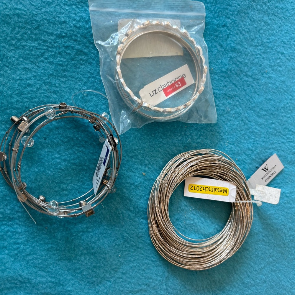 3 Silver Toned Bracelets
